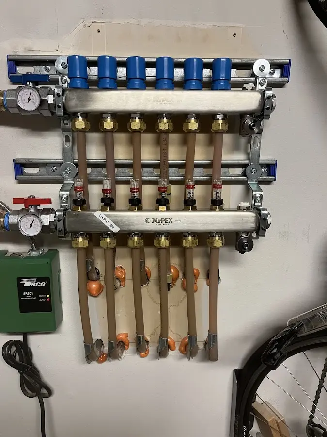 Plumber performing Gas Leak Detection at a residential property in Glasgow